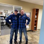 Office twins in flannel shirts